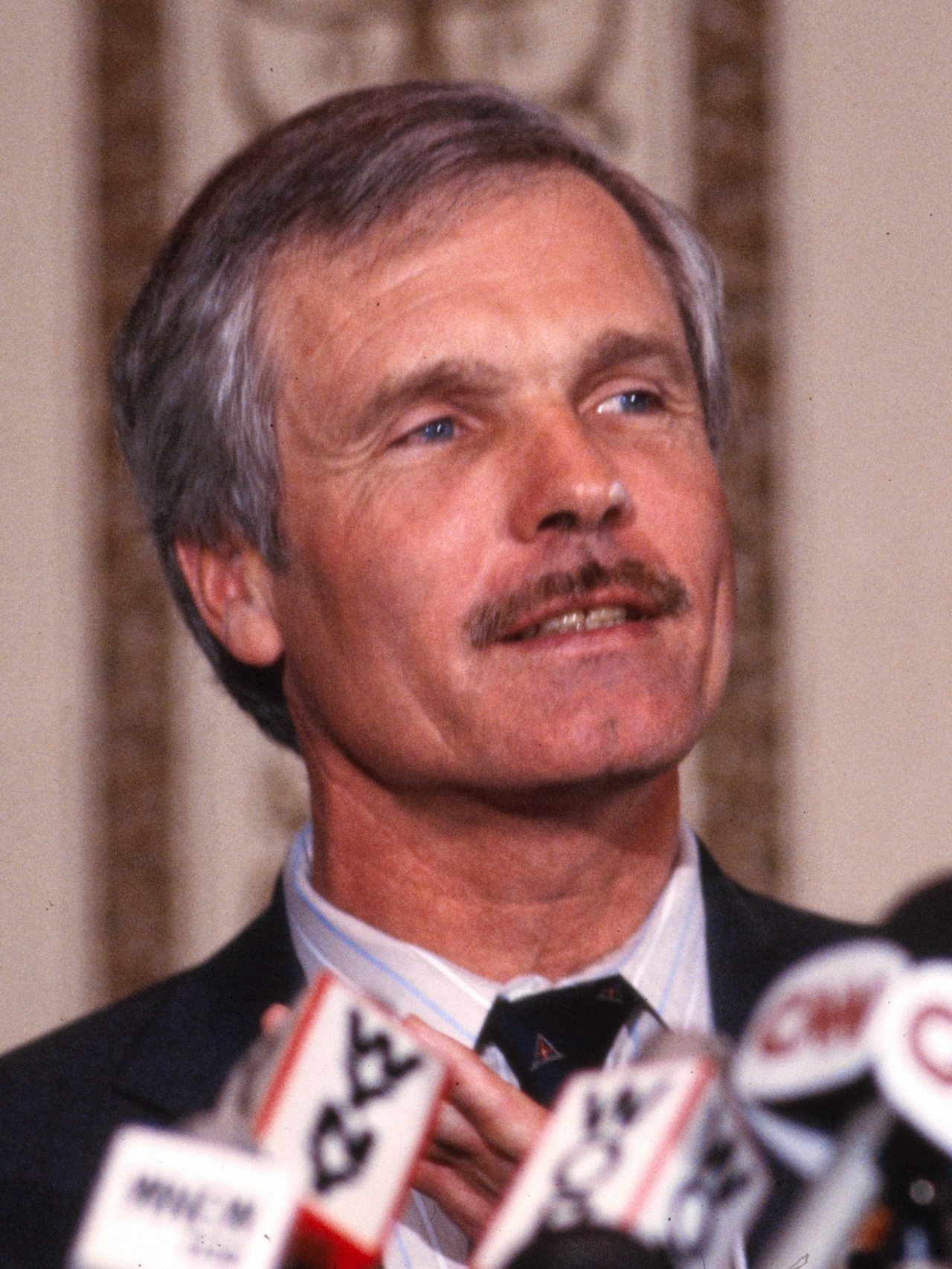 photo of Ted Turner from 1985; image in public domain and taken from Wikipedia