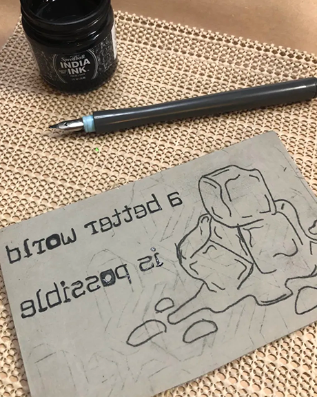 a reverse image transferred to battleship gray linoleum