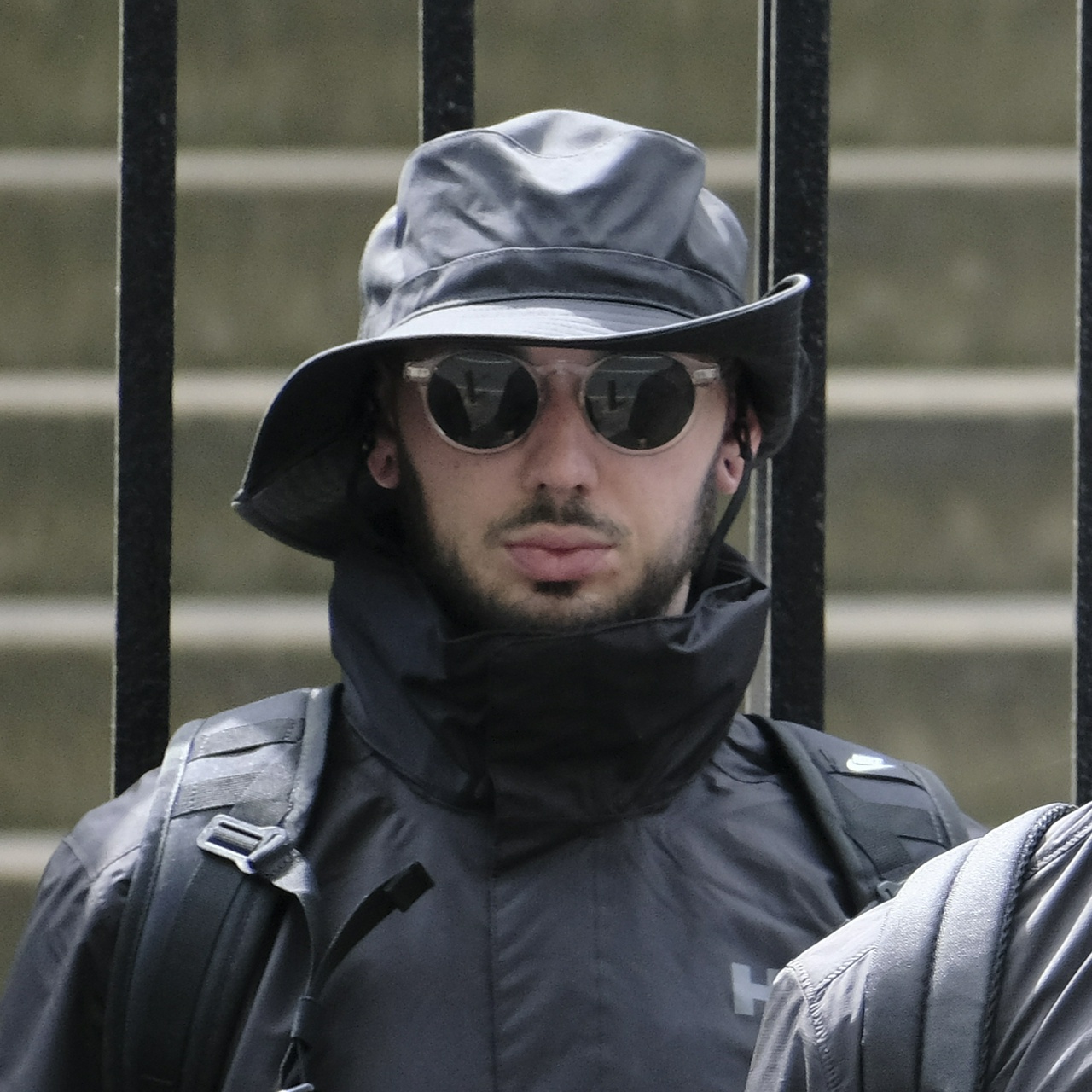 The same man from front-on, showing that he has limp empty stretched ears