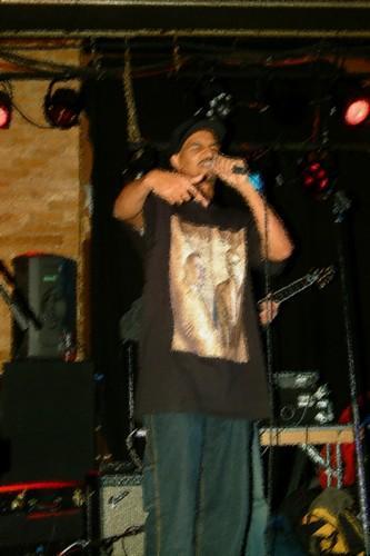 A photo of Brihanu of Junkyard Empire performing