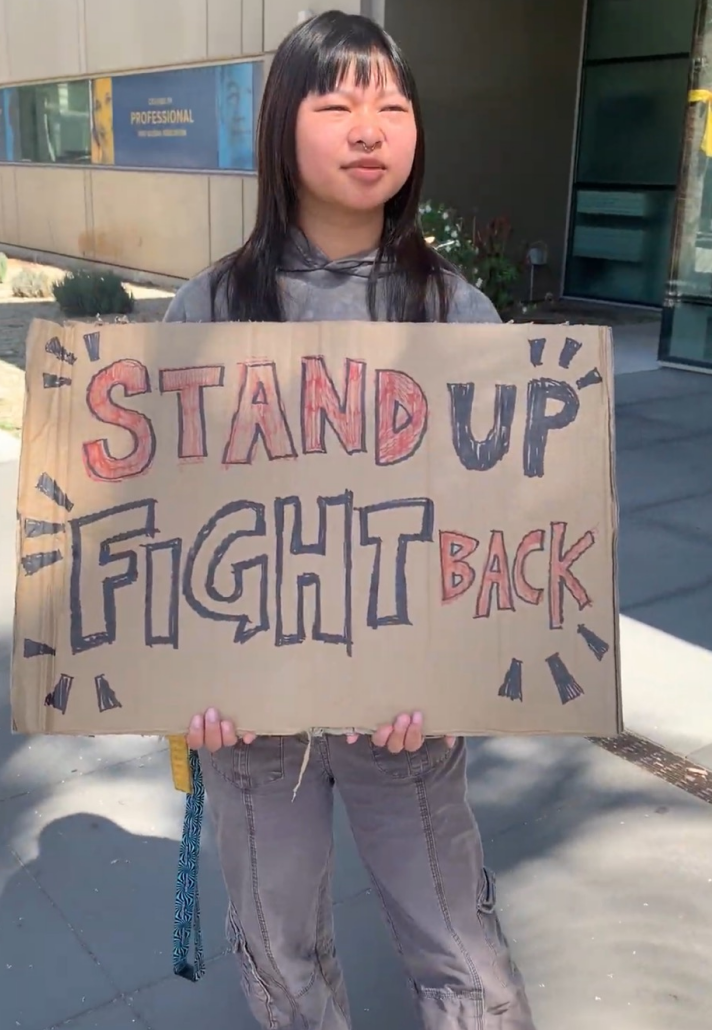 A protester holding a sign