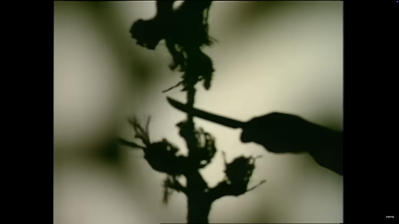 The shadow of the Phantom makes quick work of the shadow of the single rope holding up the Paris Opera House chandelier