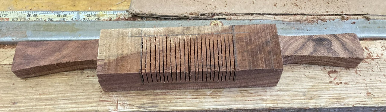 granadillo spokeshave after roughly shaping the handles and making the relief-cuts in the sole, showing the sapwood present in the piece