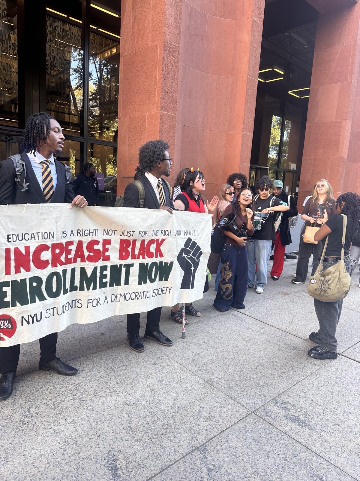 Rally at NYU calls for increasing Black enrollment.