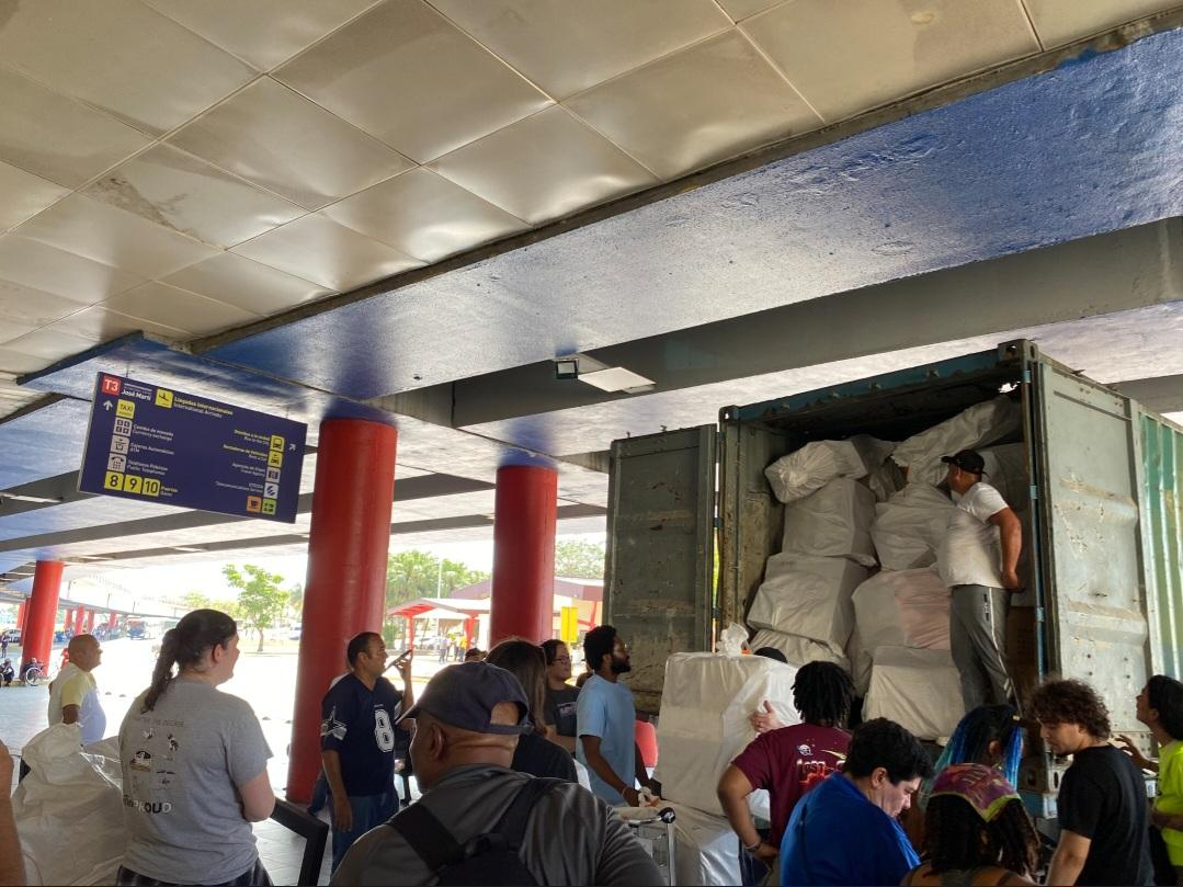 International solidarity activists unloading medical supplies in Cuba