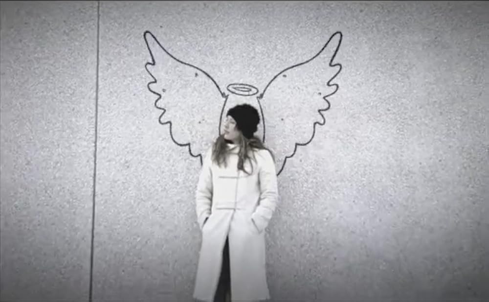 A woman sprouts angel wings and a halo on a very cold day in Montreal