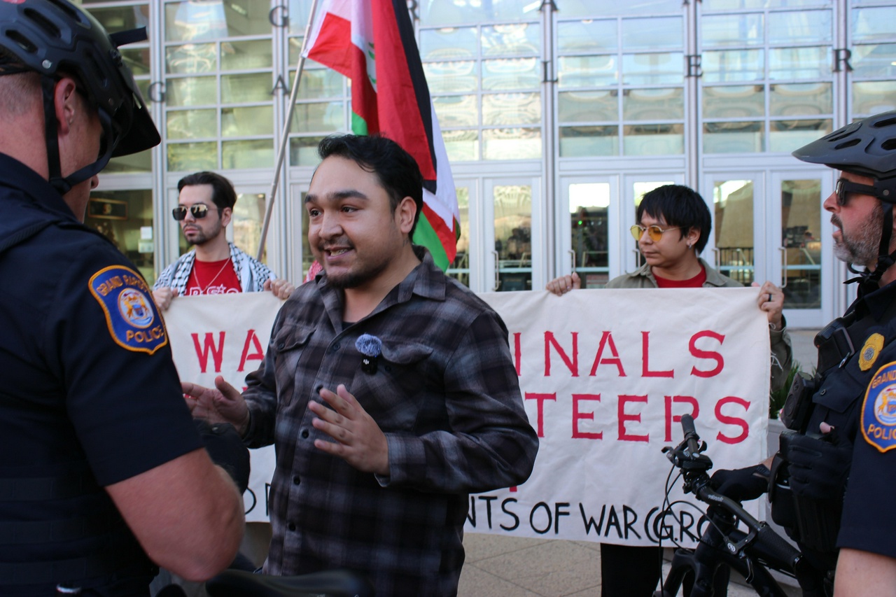 Grand Rapids protests visiting former Presidents Bush, Clinton: ‘War criminals out!’