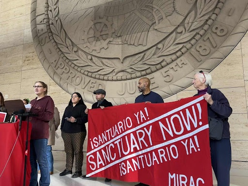 Press conference demands police contract contain penalties for officers who collaborate with Immigration and Customs Enforcement [ICE] or violate the city’s separation ordinance. | Lilian Anderson/Fight Back! News