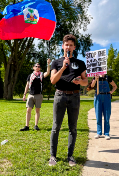 Grand Rapids rally to "Stop the mass deportation of Haitians" at Richmond Park