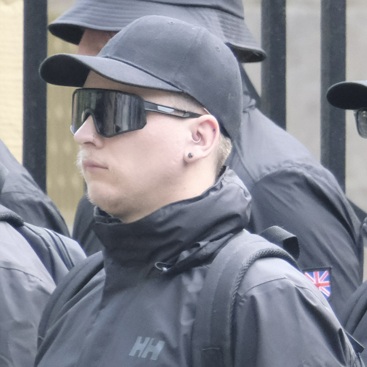 A side view of the same man where we can see he also has an inner ear ring