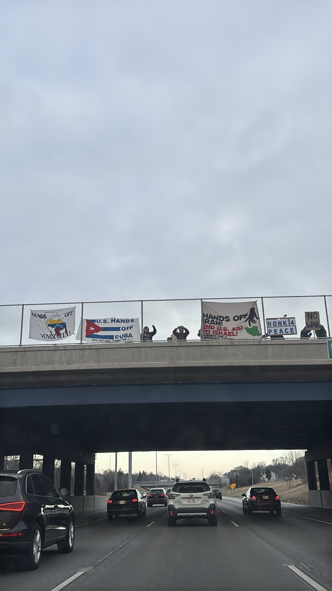 Milwaukee banner drop opposes U.S. intervention Cuba, Venezuela and Iran.