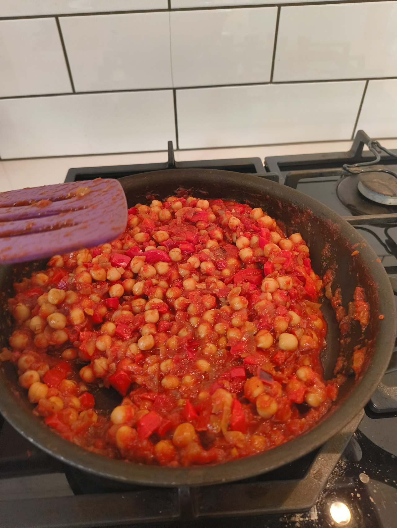 Cooking some harissa chickpeas