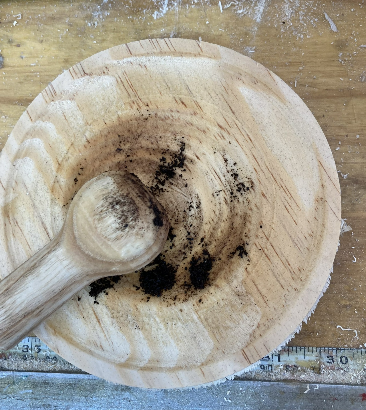 wooden mortar and pestle, viewed from above