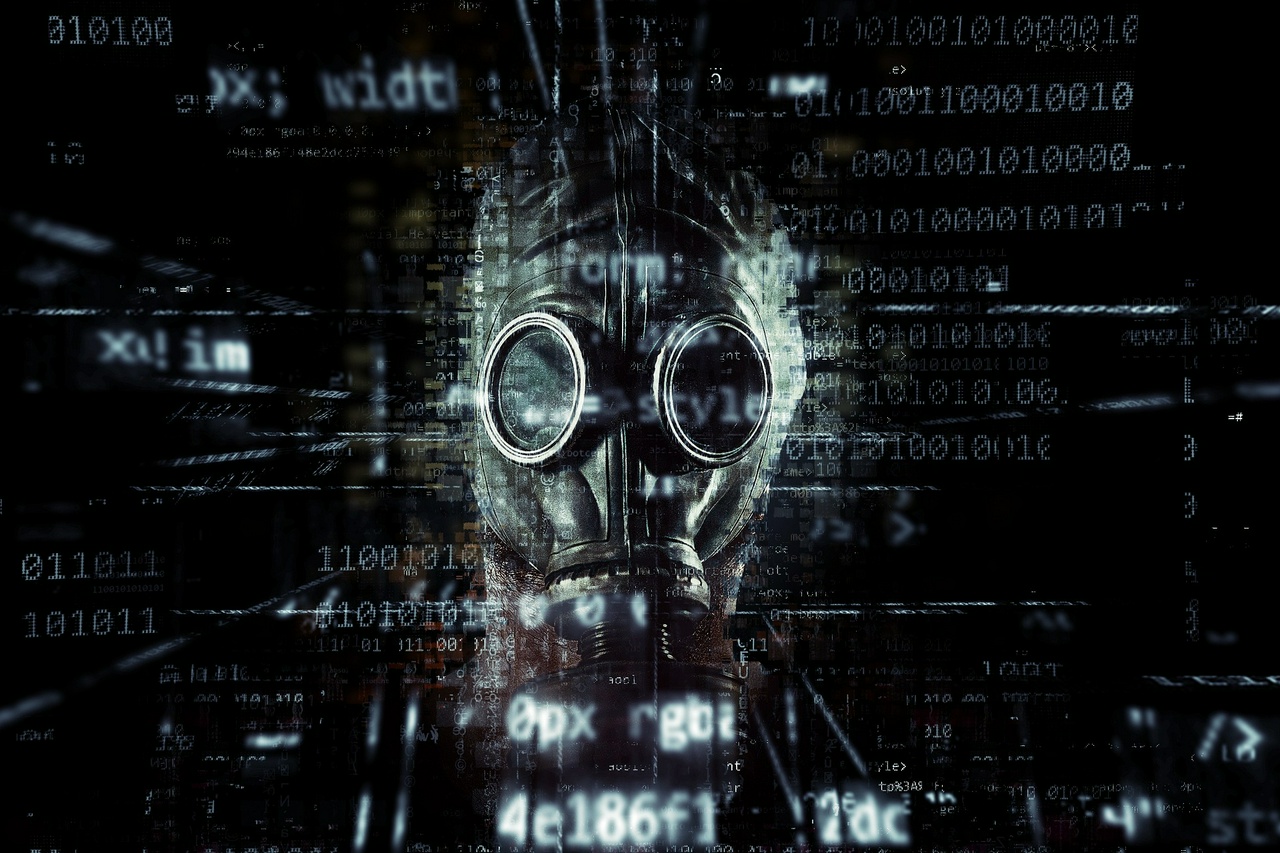A person wearing a gas mask, with computer code shown around them