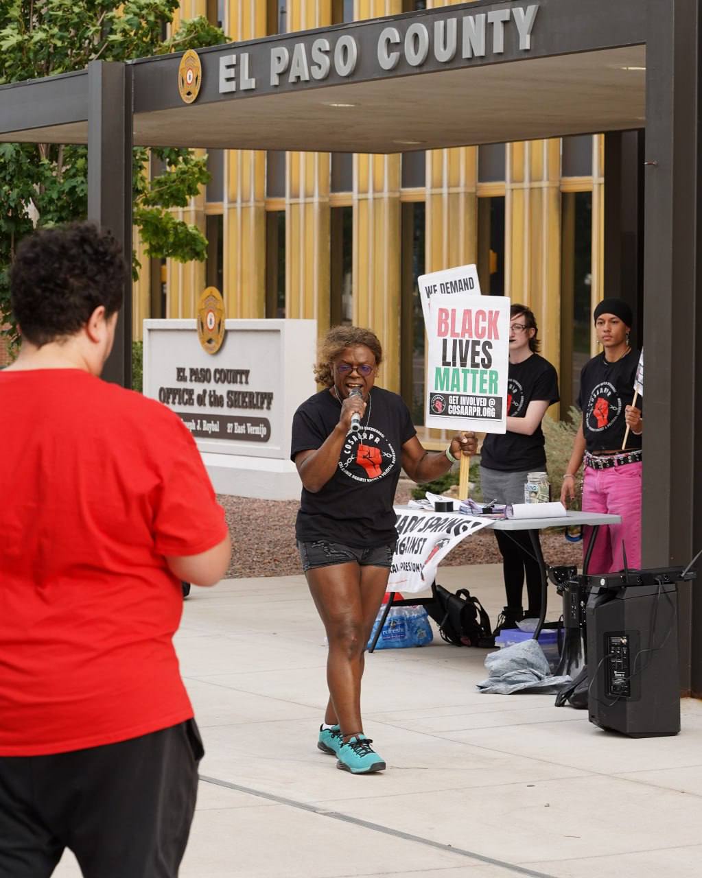 Protest demands an end to racist harassment of Black ranchers.