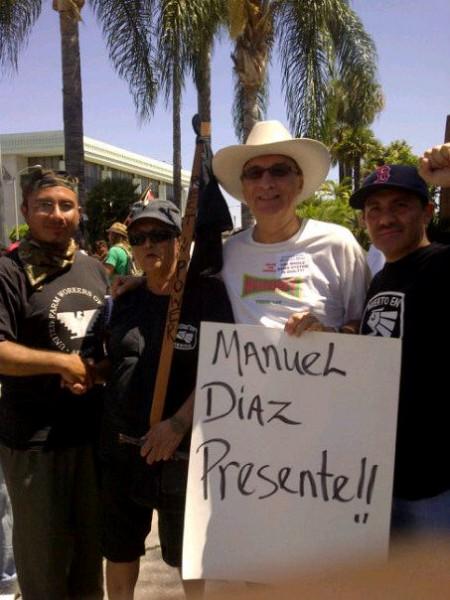 Carlos Montes at Anaheim protest against police killing.