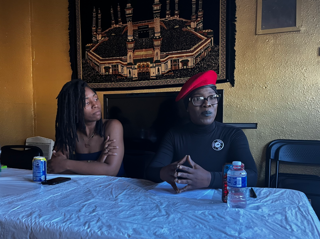 Danyelle Christmas, left, and Sister Shanta Scott, right, sit on a panel for Black History Month. | Photo: Fight Back! News Danyelle Christmas, left, and Sister Shanta Scott, right, sit on a panel for Black History Month. | Photo: Fight Back! News