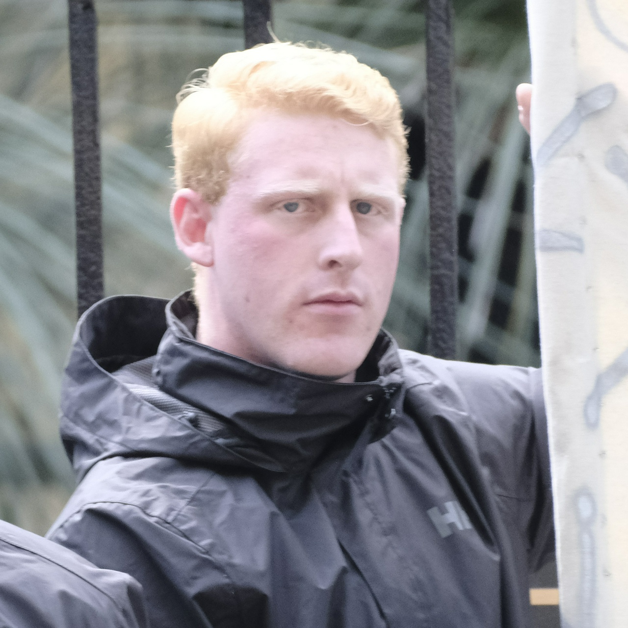 A front-on angle of Gabe showing his very large round chin, his downturned sad eyebrows and his lopsided blue eyes