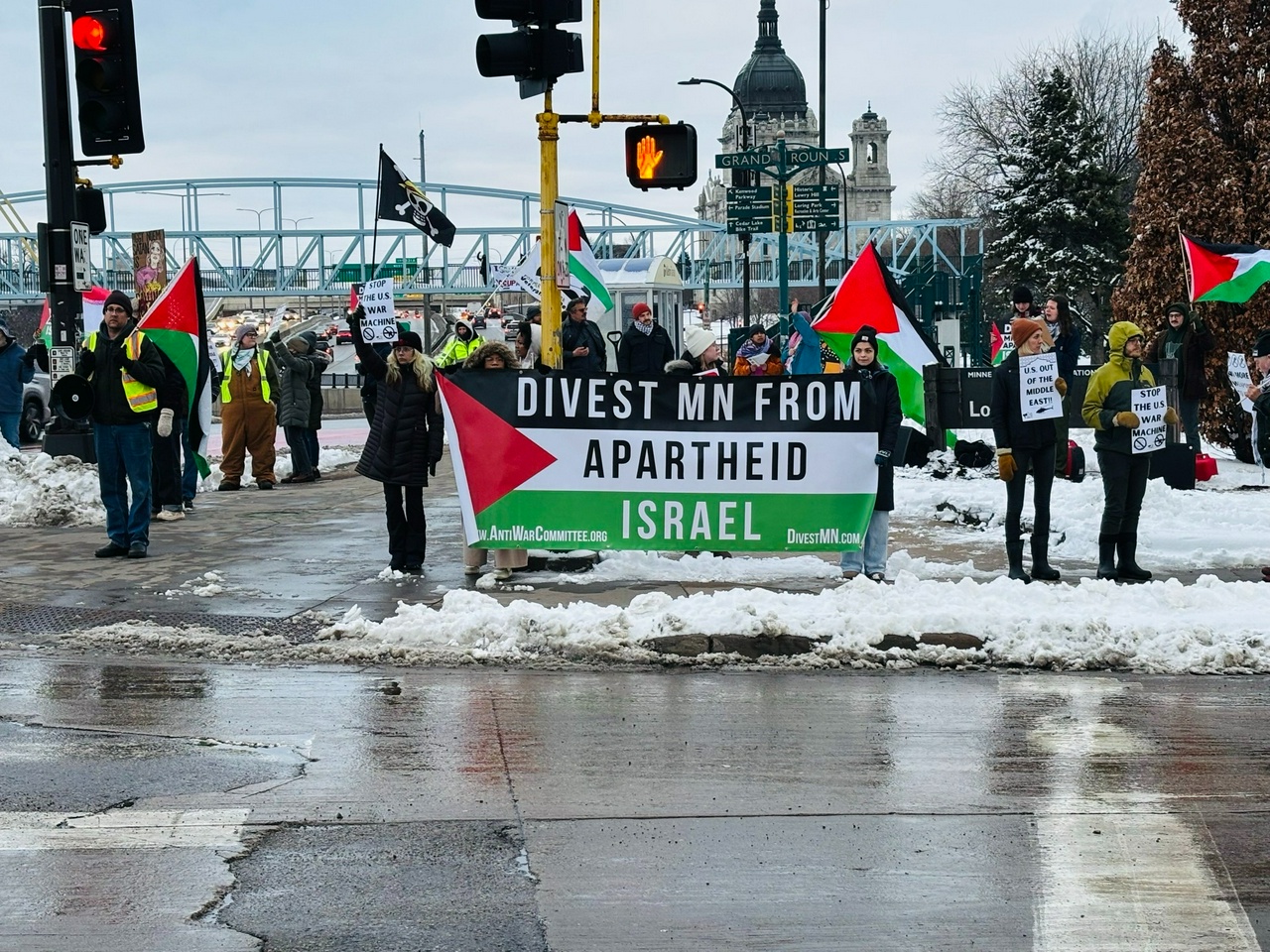 Minnesota protest presses for divestment from Israel, ICE, and Palantir.