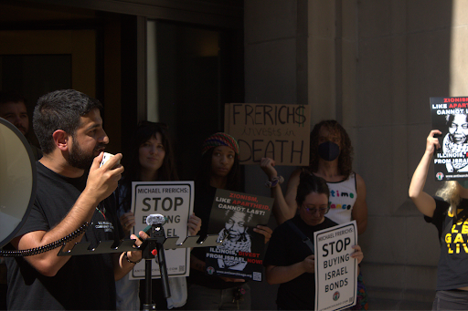 Husam Marajda of USPCN speaks outside ISBI’s offices.
