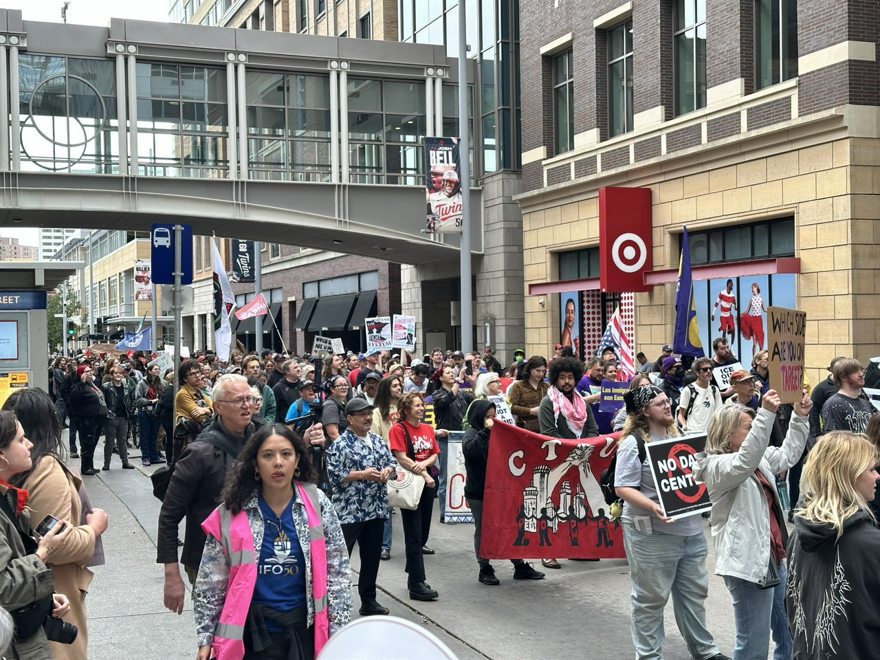 Labor-endorsed march in support of the Minnesota 15. | Fight Back! News Protesters marching in the street.