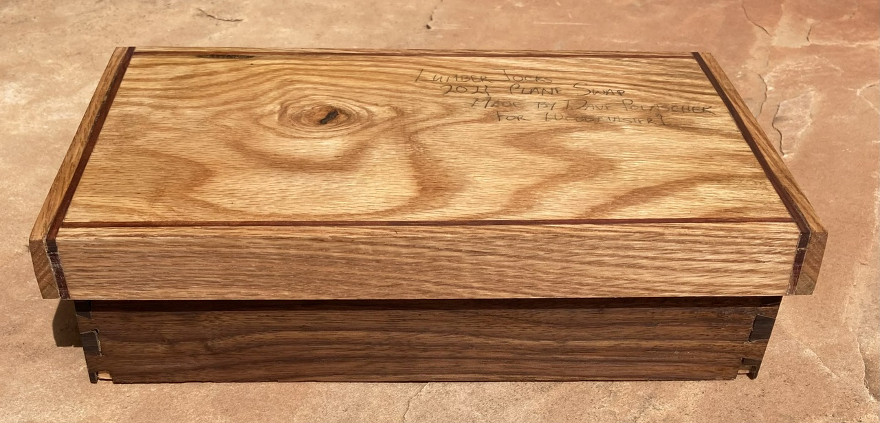 Box, closed, showing the top and the bubinga and oak edges on the lid