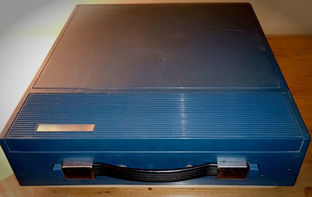 Image of the top of the box, with the label blurred out.