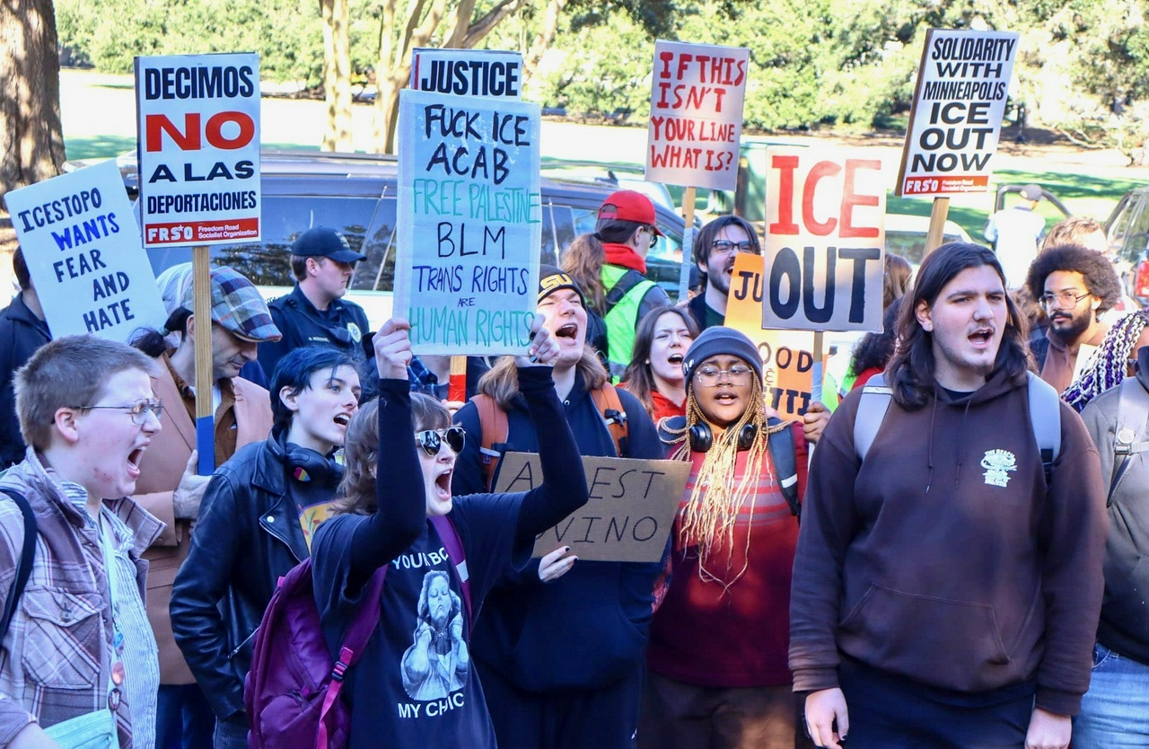 LSU students holding signs outside the student union.