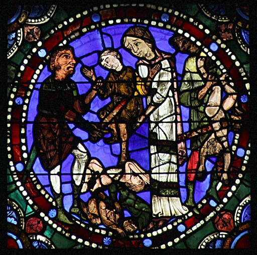 Detail of window at Chartes Cathedral showing the Massacre of the Innocents, taken from Wikimedia Commons