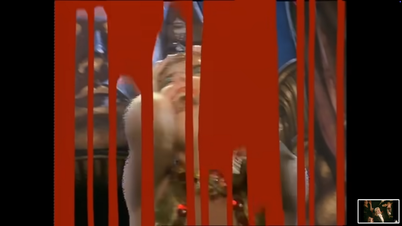 Christine sings the final high note in agony as the screen fills with blood