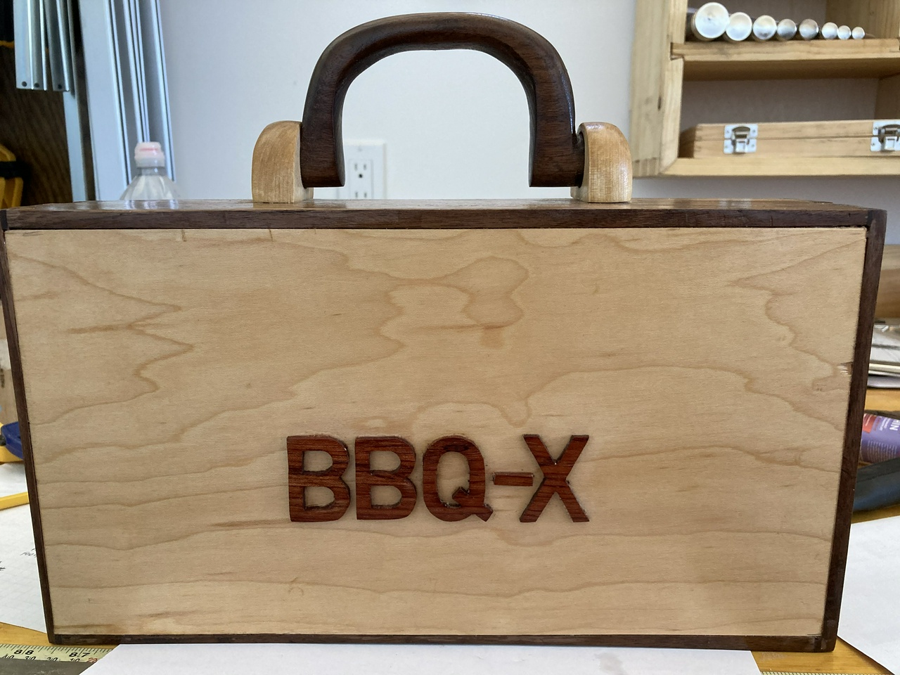 front view of the briefcase, clearly showing the BBQ-X front panel