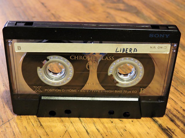 A Sony Chrome Class 60minute audio cassette sitting on a worn wood surface. The tape has a label applied that sais 'Libera' on it in block letters. Screen printing on the front surface say that it is Position Chrome - IEC II / Type II - High Bias 70 us EQ B. This type of tape would work in my 4 track recorder..