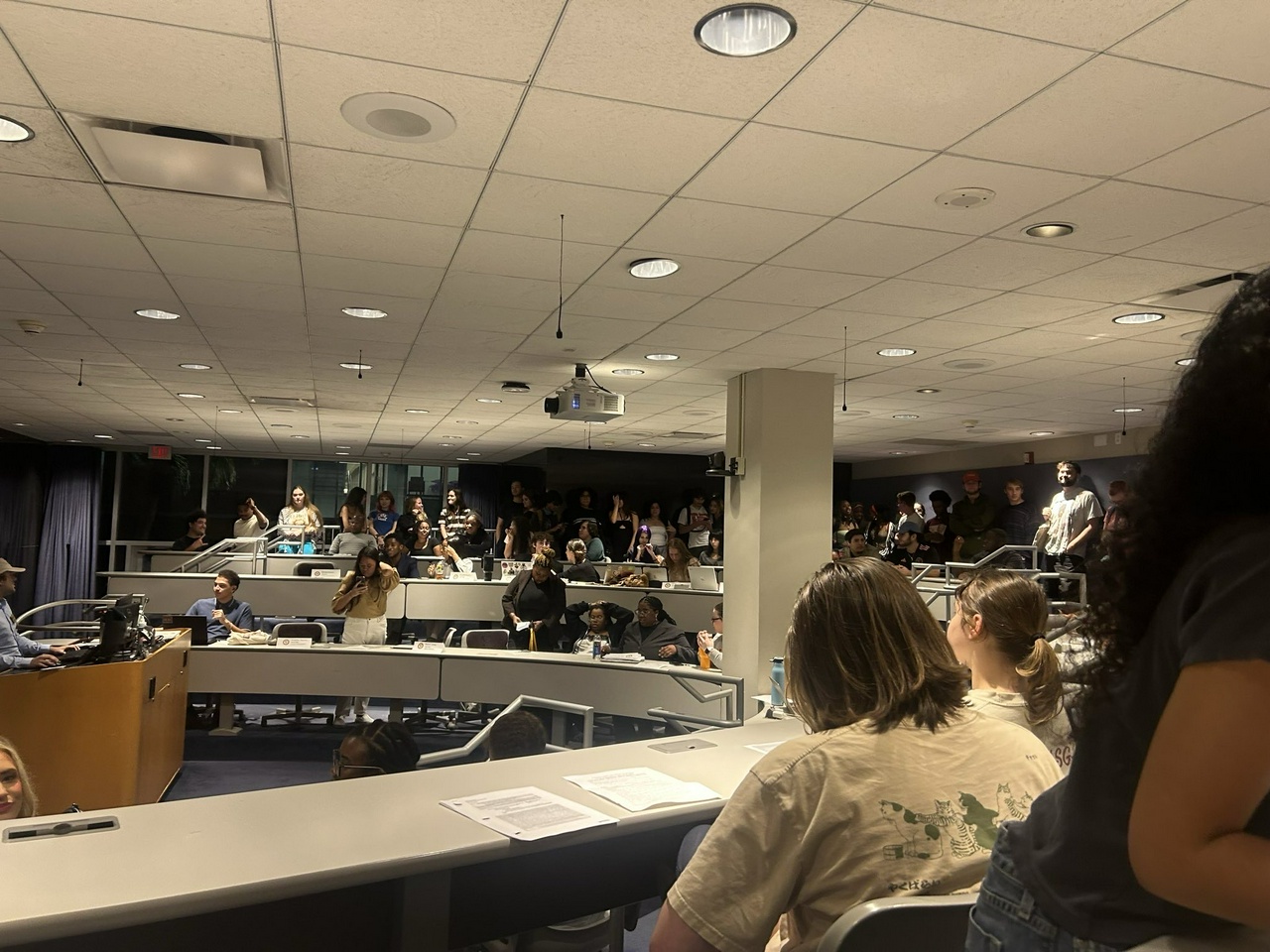 Loyola students pack the student senate chambers to show opposition against TPUSA at their first charter hearing on October 15, before defeating them again  December 3.
