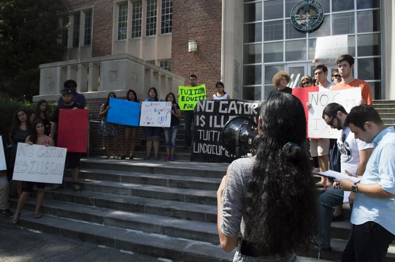 Chrisley Carpio of UF SDS addressing students in front of Tigert Hall