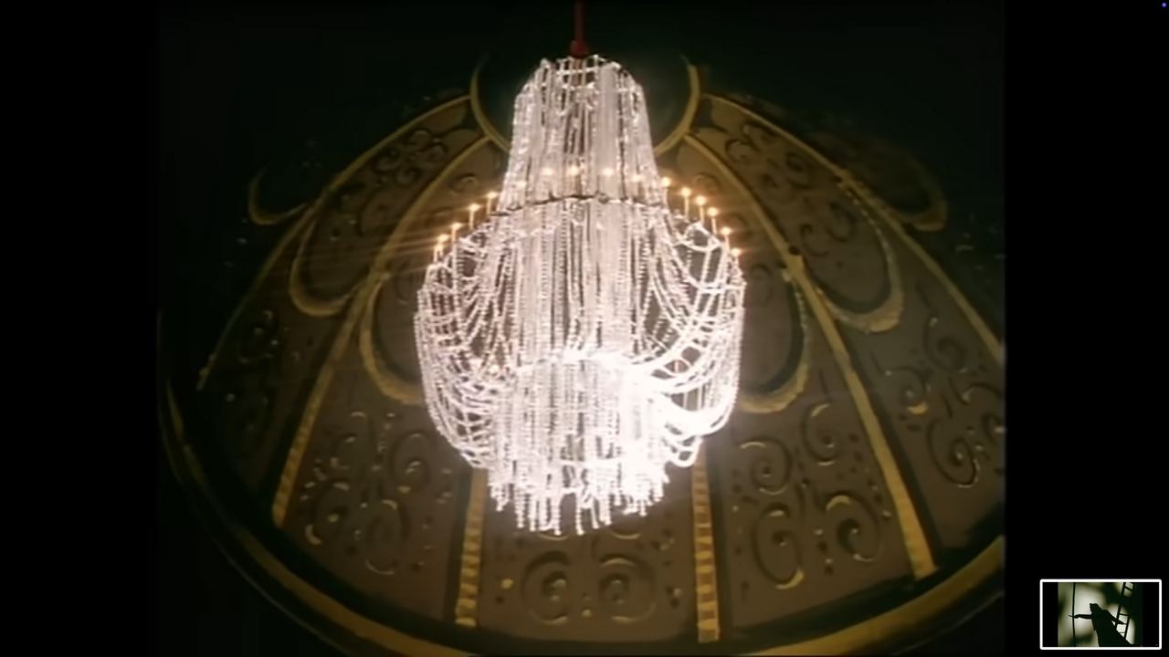 The chandelier begins to tremble