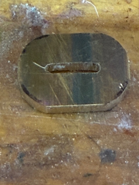 Knife ferrule filed down so it will fit inside the brass tubing