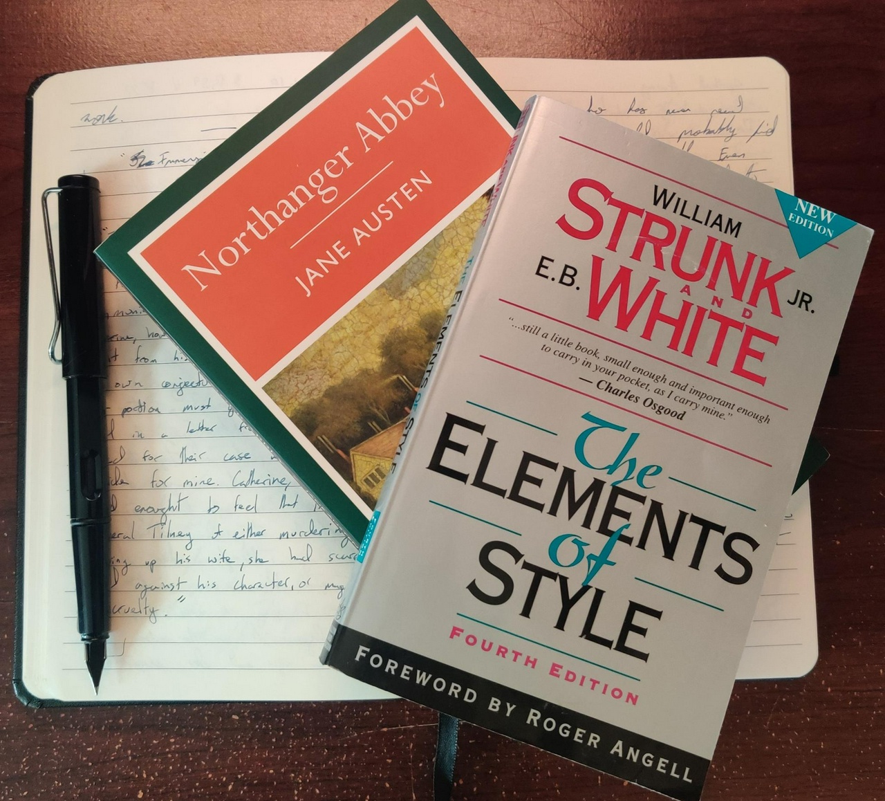 My journal and pen with a draft of this essay, along with my copy of Northanger Abber and the Elements of Style