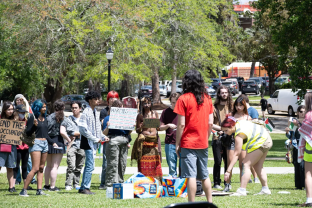 Students in Tallahassee, Florida protest at pro Israel fair.