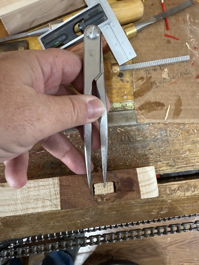 Scribing a circle the approximate size of the shaft so I can begin roughing the joint between the handle and the shaft