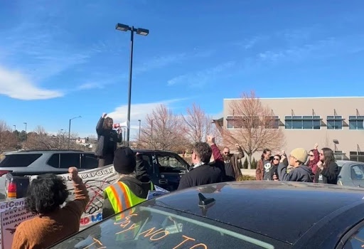 Protest demands an end to deportation flights.