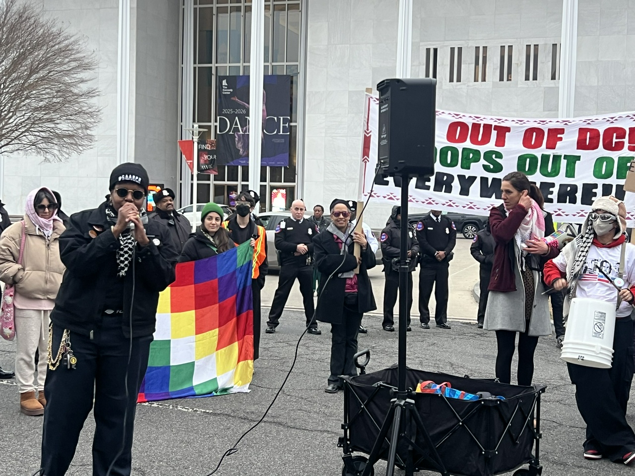 Kristen Bonner of FRSO DC gives a speech to the crowd outside the Kennedy Center denouncing the U.S. attacks on Venezuela.