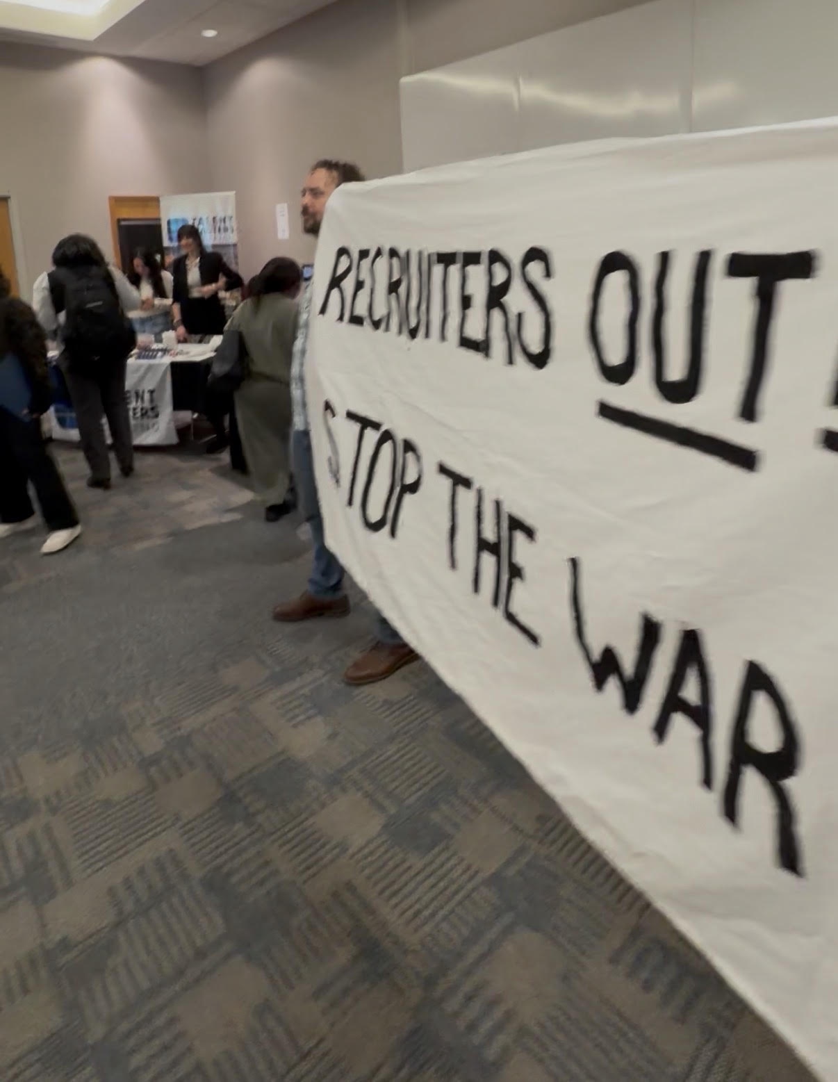 MN anti-war protesters successfully remove Army recruiters from career fair