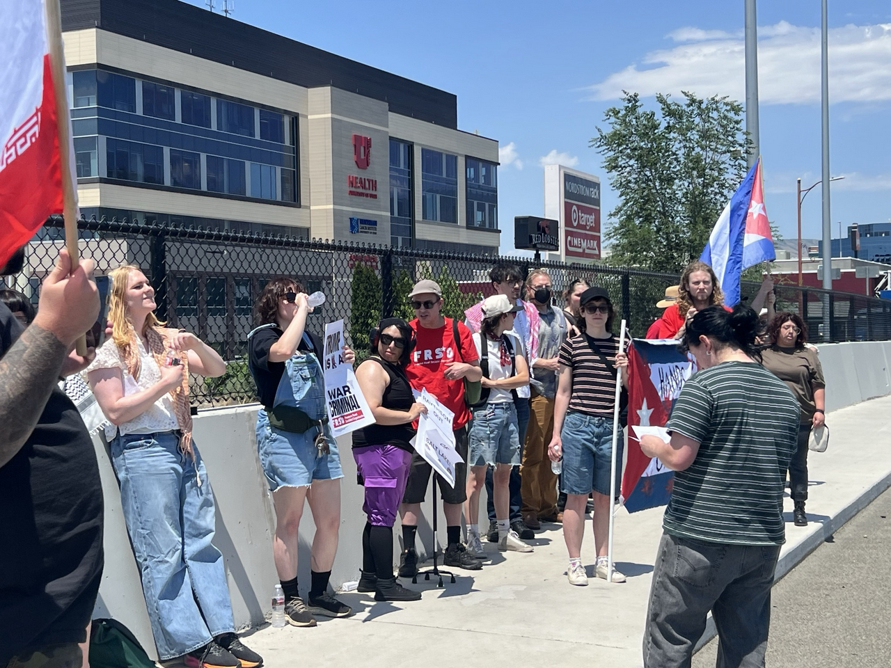 Utah anti-war activists hold overpass demonstration for Cuba