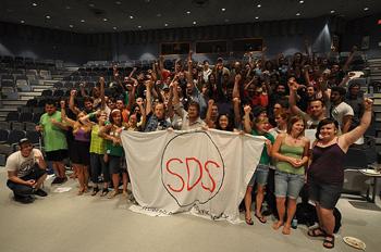 Photo of the national convention delegates with raised fists