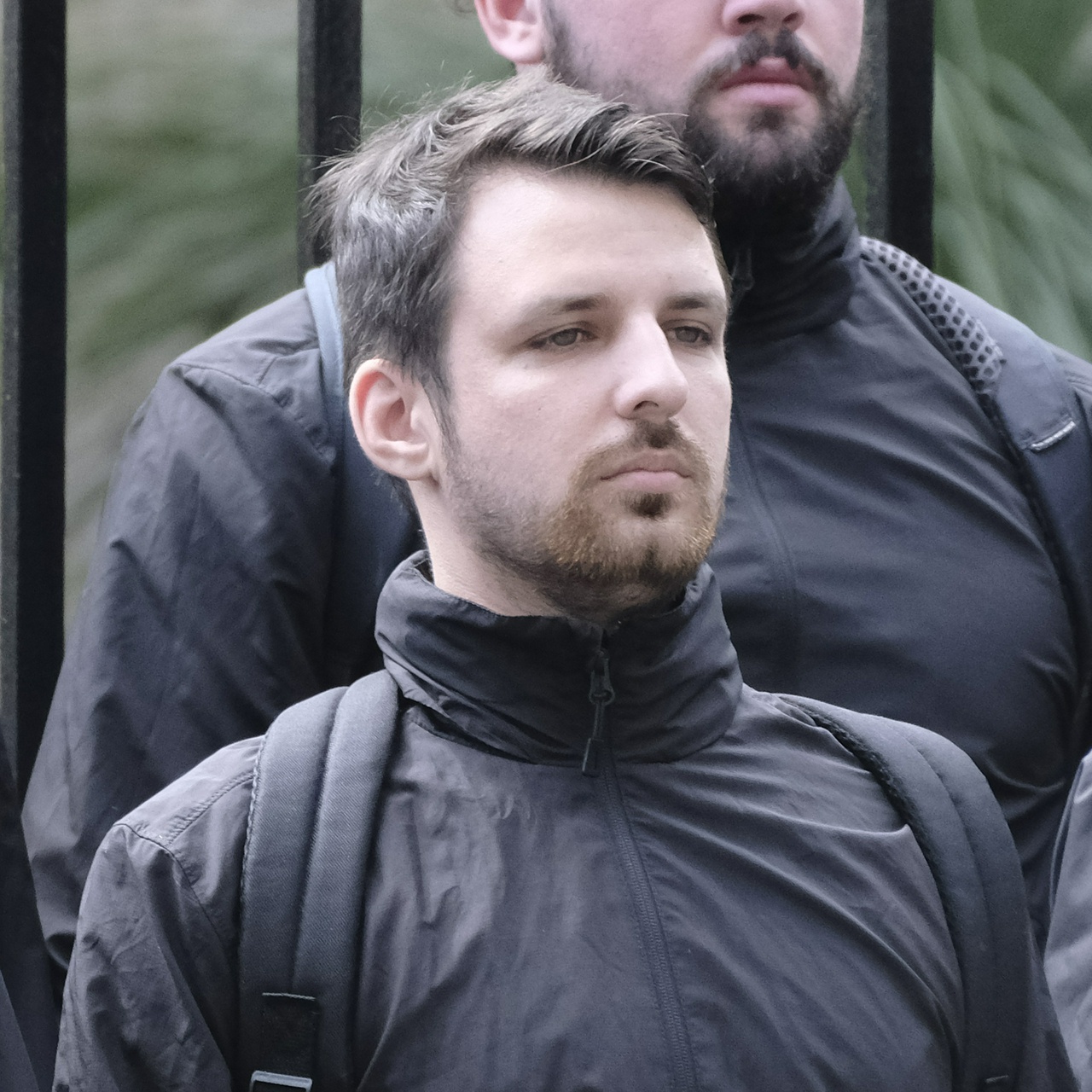 The same man looking dejectedly forwards