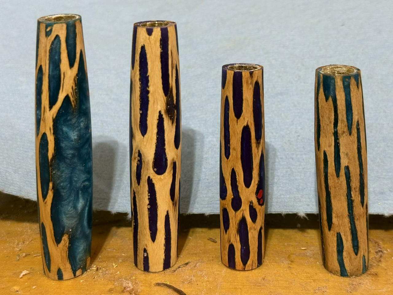 Four pen blanks made from cholla canes and resin.