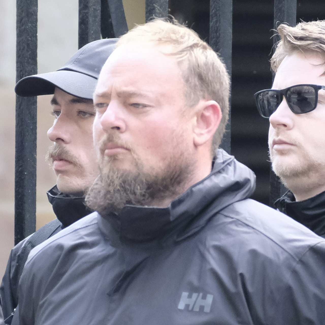 The same guy from another angle, with tiny drooping eyes and a permanently angry face