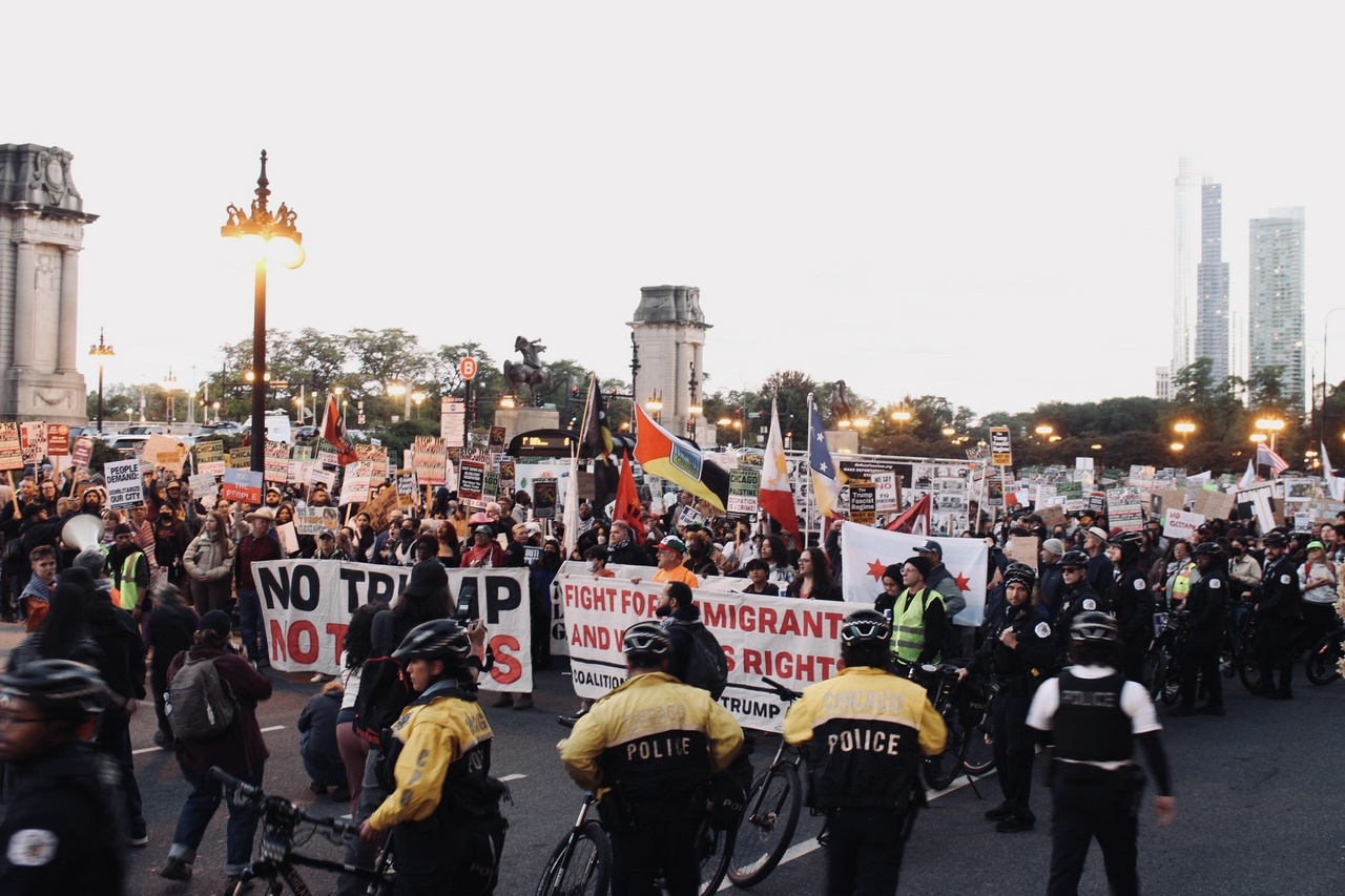 Thousands assemble on Michigan Avenue to fight back against the occupation.