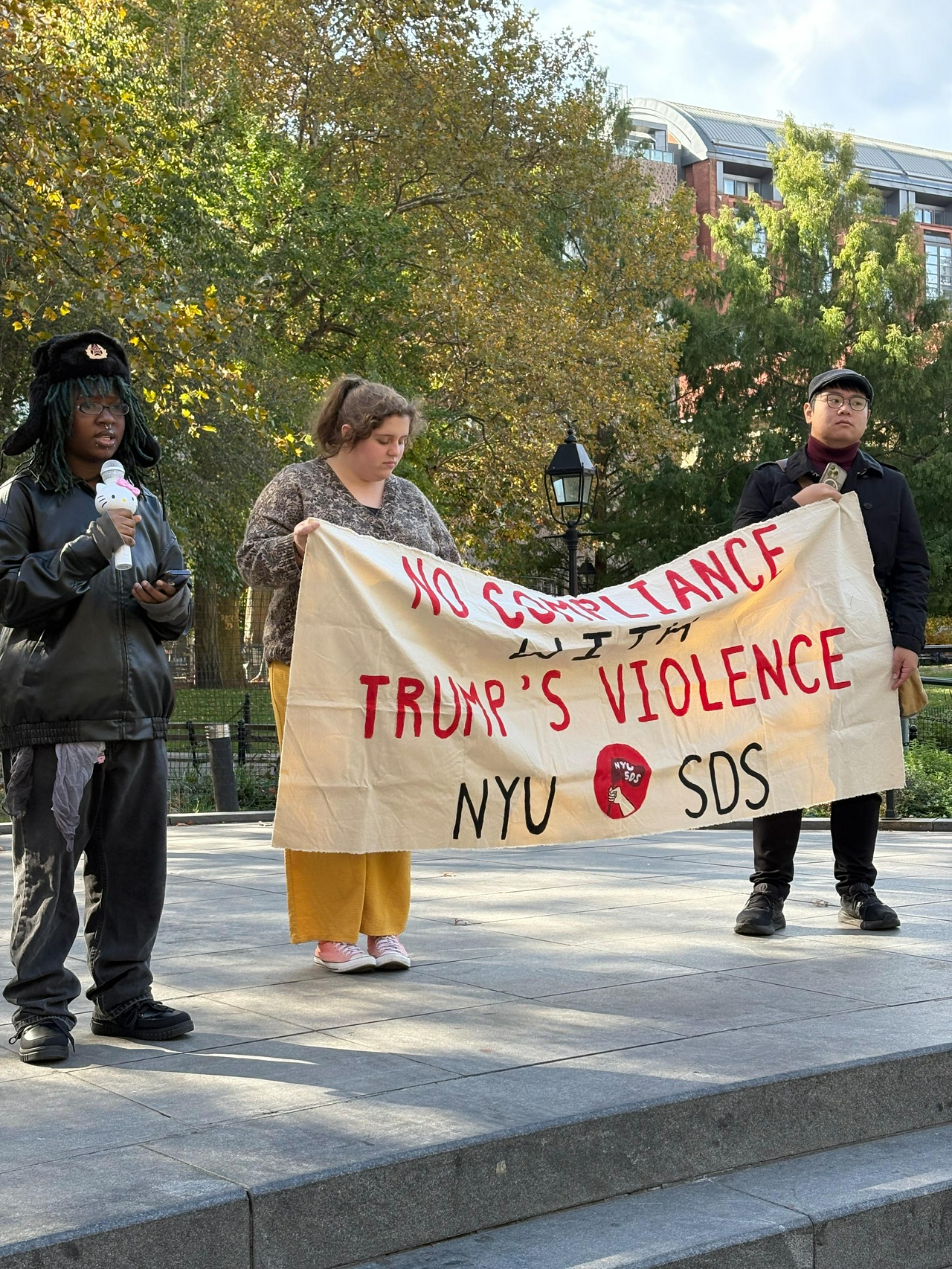 people holding a banner