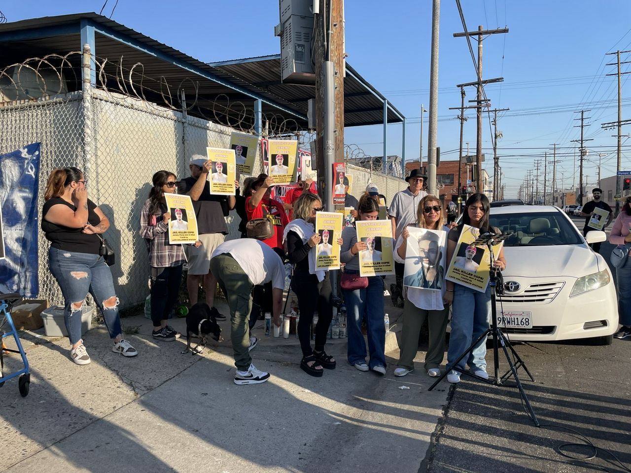 A group of protesters holding signs.